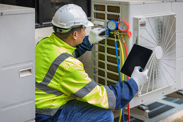 Professional Air Duct Cleaning technician working in Macon, MS